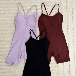 Set of 3 one pieces / jumpsuits (black, maroon, lavender)
